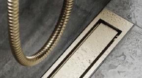 Unidrain afløb 700 mm/10 mm ramme - Børstet messing Unidrain afløb 700 mm/10 mm ramme - Børstet messing
